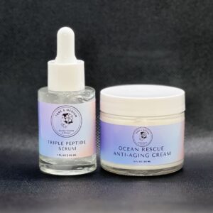 Two glass bottles of facial skincare products